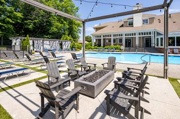 Poolside area with chairs 